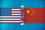 Freight ship sailing on ocean, passing between US and Chinese flags