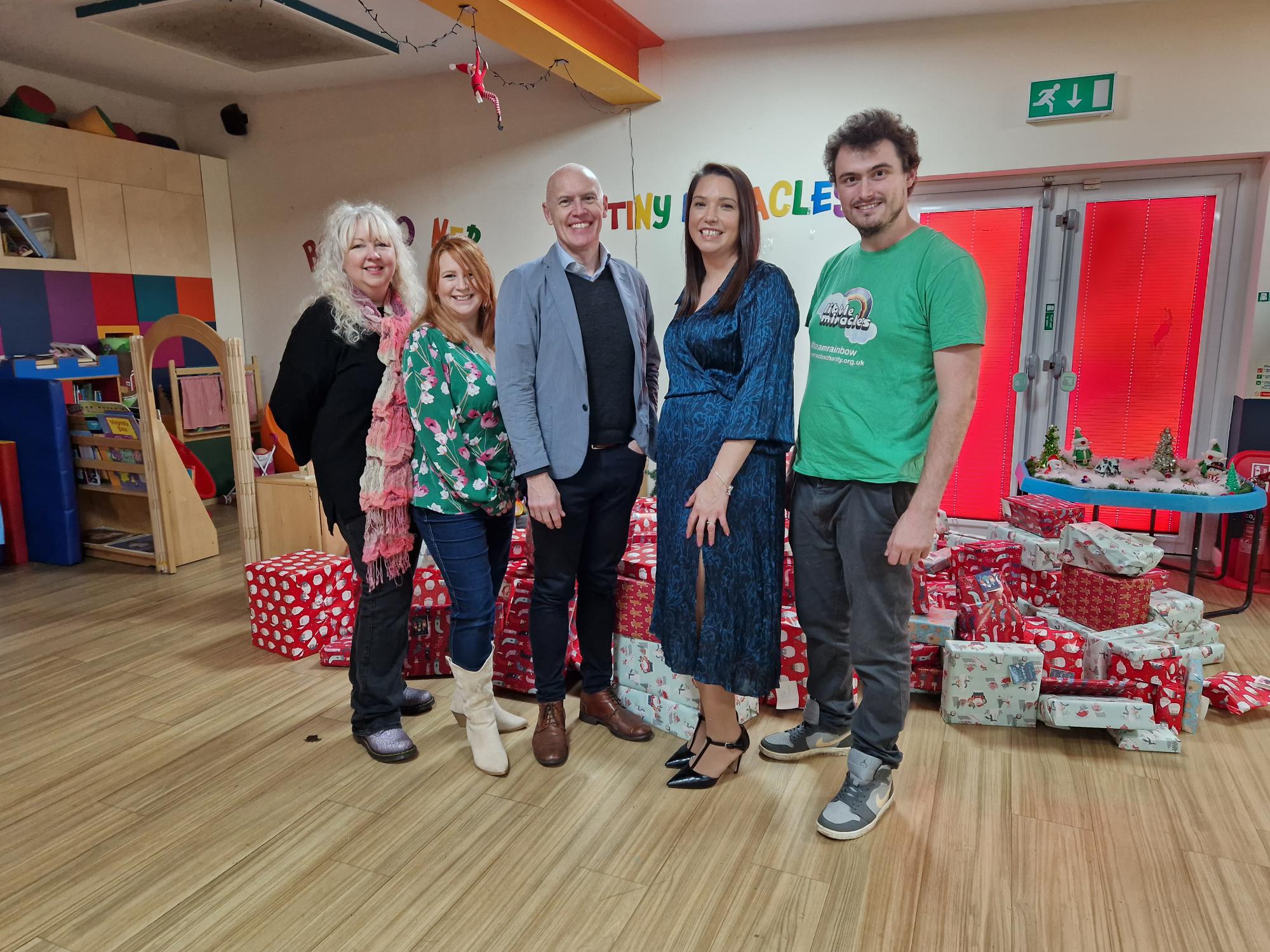 Marco Forgione and IOE&IT staff with Christmas presents