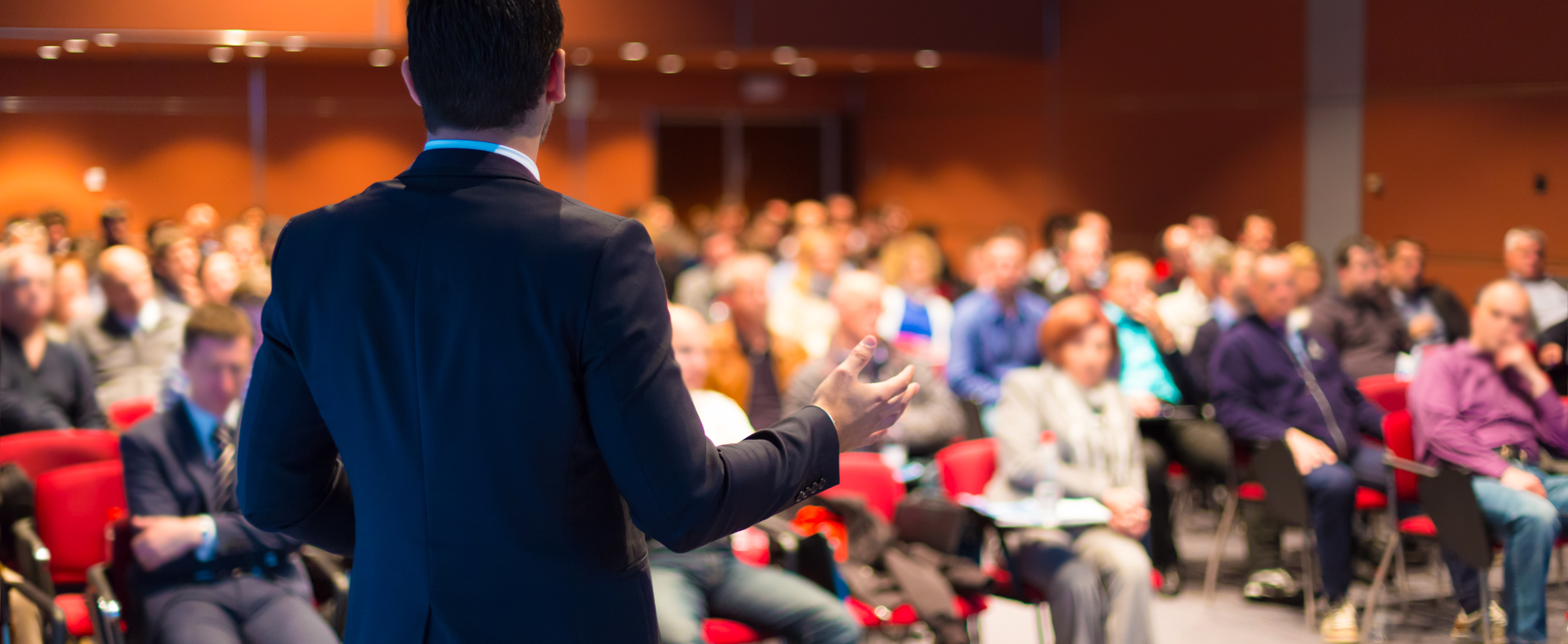 Person speaking at conference