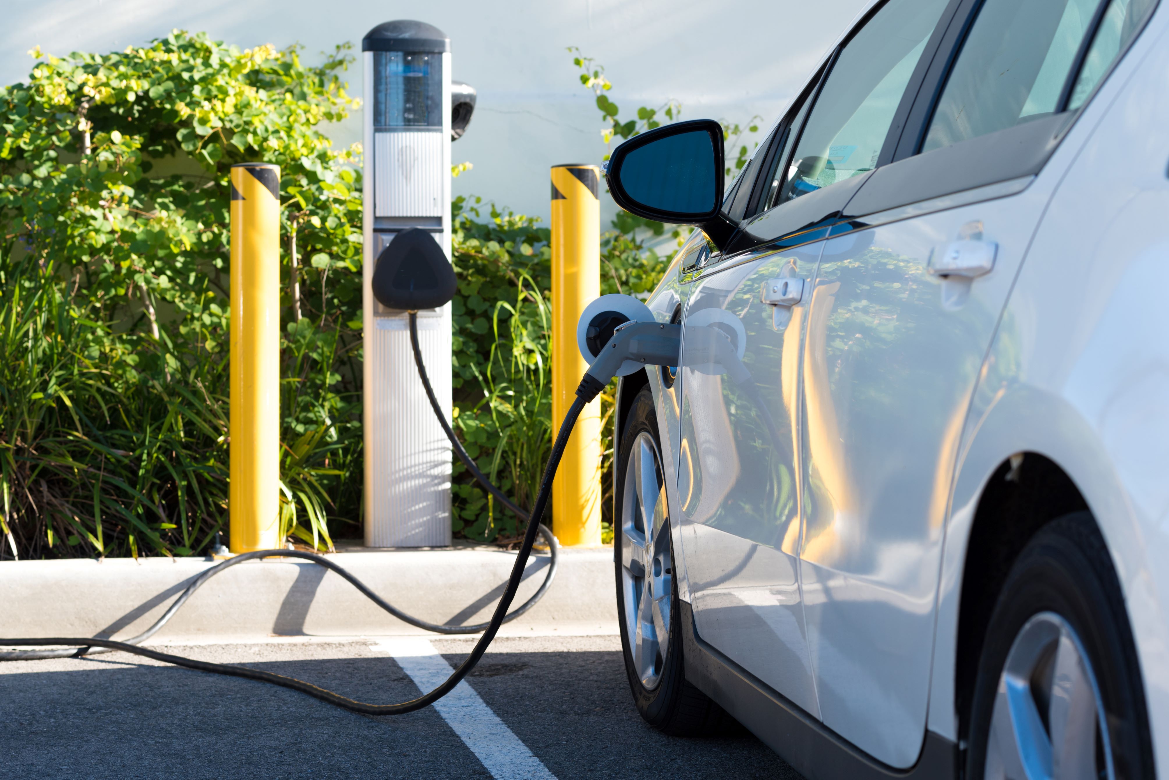 Electric car being charged