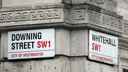 Classic street signs for Downing Street and Whitehall in minister
